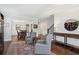 Elegant living room with hardwood floors, stylish furnishings, and bright ambiance for comfortable living at 6435 Privet Way, Cumming, GA 30028