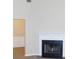 A carpeted living room with a black fireplace and white fireplace mantle at 6991 Bonnes Blvd, Austell, GA 30168
