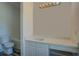 Bright bathroom features a marble countertop vanity and modern lighting fixtures at 70 Graystone Dr, Covington, GA 30014