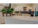 A stylish plant sits on the breakfast bar of this modern and bright kitchen at 70 Graystone Dr, Covington, GA 30014