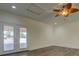 The room is equipped with doors and a ceiling fan at 70 Graystone Dr, Covington, GA 30014