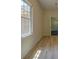 Room with wood floors and natural light at 70 Graystone Dr, Covington, GA 30014