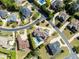 Aerial view of the luxury neighborhood with well-manicured lawns and mature trees at 8710 Merion Dr, Duluth, GA 30097