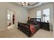 Cozy bedroom with plush carpet, complemented by a decorative bed frame and ample natural light at 8710 Merion Dr, Duluth, GA 30097
