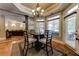 Charming breakfast nook with a modern chandelier, natural light, and outdoor access at 8710 Merion Dr, Duluth, GA 30097