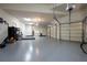Spacious three car garage with ample storage and lighting at 8710 Merion Dr, Duluth, GA 30097