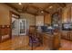 Office features wood-paneled walls, beamed ceilings, and custom shelving at 8710 Merion Dr, Duluth, GA 30097