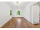 Spacious bedroom with hardwood floors, natural light, and ample room for personalization at 1675 Avon Sw Ave, Atlanta, GA 30311