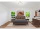 Serene bedroom featuring a comfortable bed, stylish decor, and plenty of natural light at 1675 Avon Sw Ave, Atlanta, GA 30311