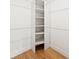 Walk-in closet with custom shelving at 1675 Avon Sw Ave, Atlanta, GA 30311
