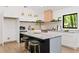 Well-lit kitchen featuring stylish countertops, modern appliances, and ample cabinet space at 1675 Avon Sw Ave, Atlanta, GA 30311