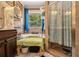 Bathroom featuring soaking tub, tiled shower, and wicker storage at 1699 Boulder Walk Se Dr, Atlanta, GA 30316