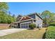 This home has a well-manicured lawn, side entry garage, and a classic home design at 1699 Boulder Walk Se Dr, Atlanta, GA 30316
