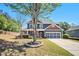 Inviting two-story home with a manicured lawn and classic architectural details at 1699 Boulder Walk Se Dr, Atlanta, GA 30316