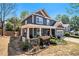 Beautiful home featuring a welcoming front porch and a well-maintained, landscaped front yard and attached garage at 1699 Boulder Walk Se Dr, Atlanta, GA 30316
