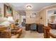 Inviting hallway with seating leading to the office and the living room at 1699 Boulder Walk Se Dr, Atlanta, GA 30316