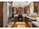 Well-equipped kitchen with stainless steel appliances, granite countertops, and ample cabinet space at 1699 Boulder Walk Se Dr, Atlanta, GA 30316
