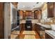 Well-equipped kitchen with stainless steel appliances, granite countertops, and ample cabinet space at 1699 Boulder Walk Se Dr, Atlanta, GA 30316