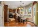 Cozy kitchen with stainless steel appliances, dark wood cabinets, eat in kitchen and an abundance of natural light at 1699 Boulder Walk Se Dr, Atlanta, GA 30316