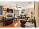 Cozy living room with hardwood floors, fireplace and TV at 1699 Boulder Walk Se Dr, Atlanta, GA 30316