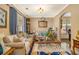 Cozy living room featuring comfortable seating, elegant decor, and ample natural light at 1699 Boulder Walk Se Dr, Atlanta, GA 30316