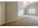 Cozy main bedroom with neutral paint, carpet, and vaulted ceiling at 433 Orchid Ln, Canton, GA 30114