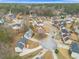 Aerial view of a residential neighborhood showcasing well-maintained homes and tree-lined streets in a serene setting at 1029 Chaterly Ct, Riverdale, GA 30296