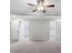 Bedroom with doors leading to separate rooms at 1029 Chaterly Ct, Riverdale, GA 30296