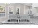 Kitchen sink with a granite countertop at 1029 Chaterly Ct, Riverdale, GA 30296
