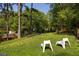 Spacious backyard with plush green lawn and seating area, perfect for relaxing outdoors at 1608 Terry Mill Se Rd, Atlanta, GA 30316