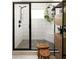 Modern bathroom featuring a glass-enclosed shower with stylish tiling and fixtures at 1608 Terry Mill Se Rd, Atlanta, GA 30316