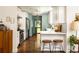 Modern kitchen with white cabinets, stainless steel appliances, and hardwood floors at 1608 Terry Mill Se Rd, Atlanta, GA 30316