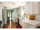 Bright kitchen featuring white countertops, stainless steel appliances, and hardwood floors at 1608 Terry Mill Se Rd, Atlanta, GA 30316