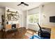 Well-lit office with hardwood floors, a modern desk, and large windows with outdoor views at 1608 Terry Mill Se Rd, Atlanta, GA 30316