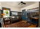 Inviting home office with dark blue accent wall, hardwood floors, and natural light at 1608 Terry Mill Se Rd, Atlanta, GA 30316