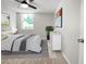 Bedroom featuring a queen bed, carpet floors, and a large window at 2965 Pharr Court South Nw # 110, Atlanta, GA 30305