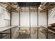 Spacious walk-in closet with metal shelving, hanging rods, and ample storage space at 2965 Pharr Court South Nw # 110, Atlanta, GA 30305