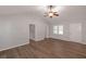 Bright living room with wood flooring, vaulted ceiling, and neutral paint at 304 N Briar Rdg, Woodstock, GA 30189