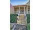 Inviting entryway featuring a staircase leading to the covered front porch at 304 N Briar Rdg, Woodstock, GA 30189
