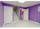 Basement with staircase, bathroom, white doors and light purple walls at 873 Edgewater Cir, Marietta, GA 30062