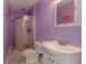 Bathroom featuring a glass shower, white toilet and sink with vanity at 873 Edgewater Cir, Marietta, GA 30062