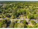An aerial view of homes nestled among the trees in this lovely neighborhood at 2358 Larchwood Sw Rd, Atlanta, GA 30310
