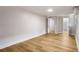 Bedroom features luxury vinyl plank flooring, neutral paint, and mini split at 2358 Larchwood Sw Rd, Atlanta, GA 30310
