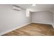 Finished bedroom featuring LVP floors, neutral walls, and lots of light at 2358 Larchwood Sw Rd, Atlanta, GA 30310