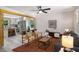 Bright living room open to the kitchen, featuring stylish furnishings and decor at 2358 Larchwood Sw Rd, Atlanta, GA 30310