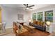 Cozy living room with a gray sofa, modern accents, and bright natural light at 2358 Larchwood Sw Rd, Atlanta, GA 30310