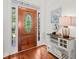 A beautifully designed wooden front door leads into a warm and inviting home at 675 Jack Page Ln, Canton, GA 30115