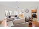 Bright living room features hardwood floors and comfortable seating at 675 Jack Page Ln, Canton, GA 30115