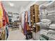 Spacious walk-in closet with ample shelving and organizational system for storage at 675 Jack Page Ln, Canton, GA 30115