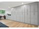 Basement featuring custom gray storage cabinets and a built-in desk area at 1255 Cold Harbor Dr, Roswell, GA 30075
